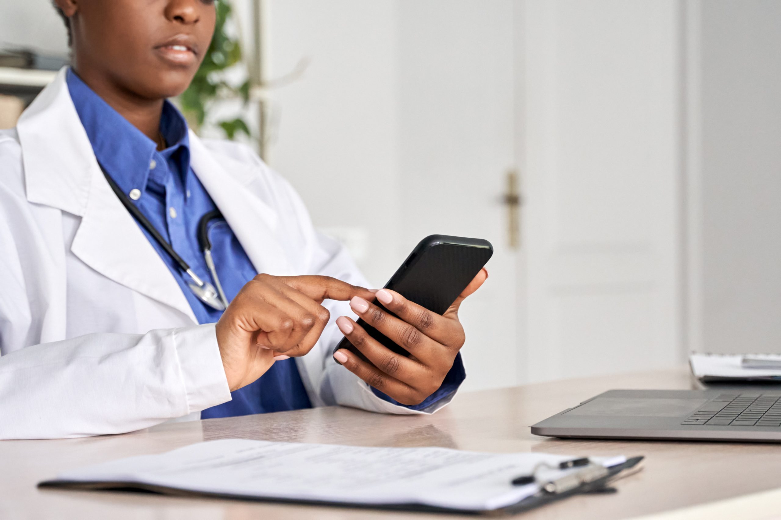 Doctor using a mobile phone