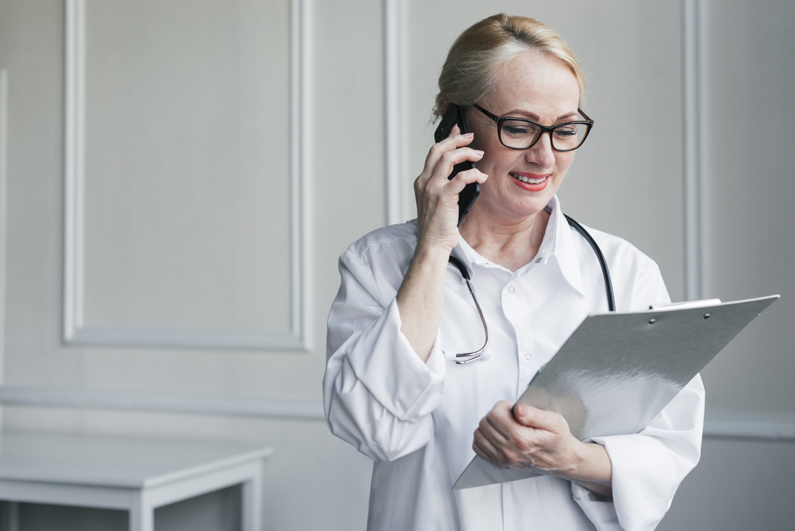 Doctor reviewing a medical and practice report