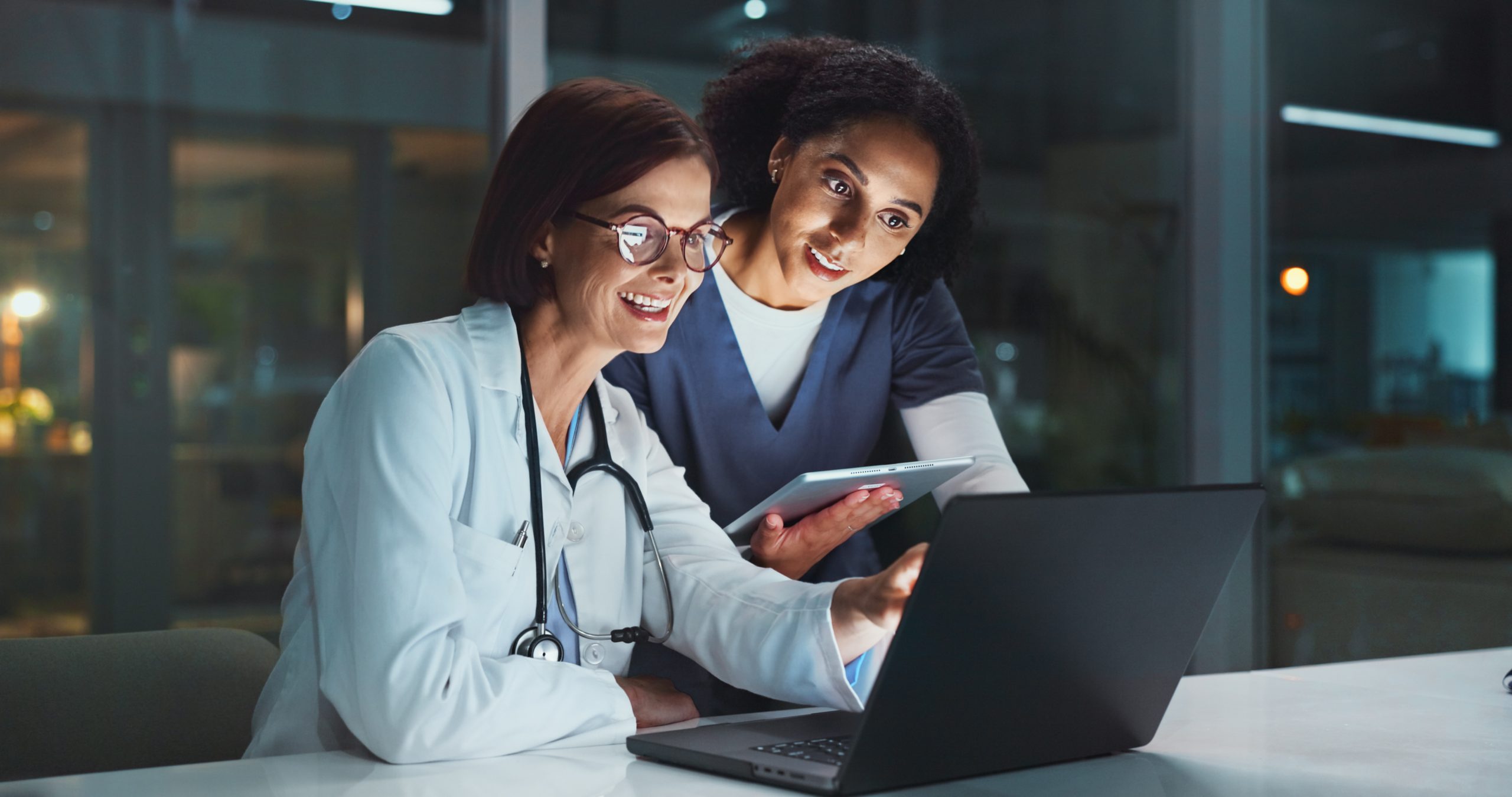 Doctor using technology to review medical information